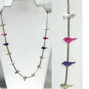 Sterling silver and multi-colored fetish necklace.